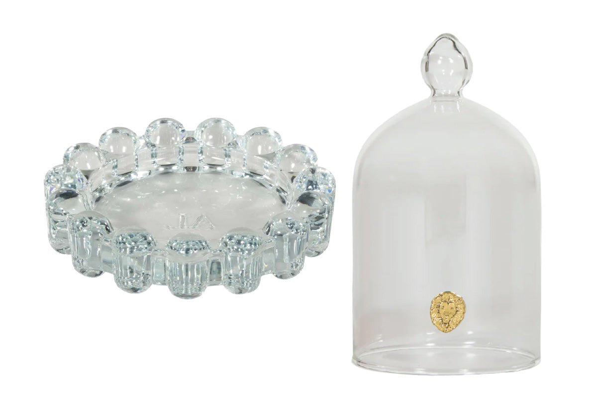 Plat à bougie et cloche en verre élégants avec ambiance en couches pour le salon